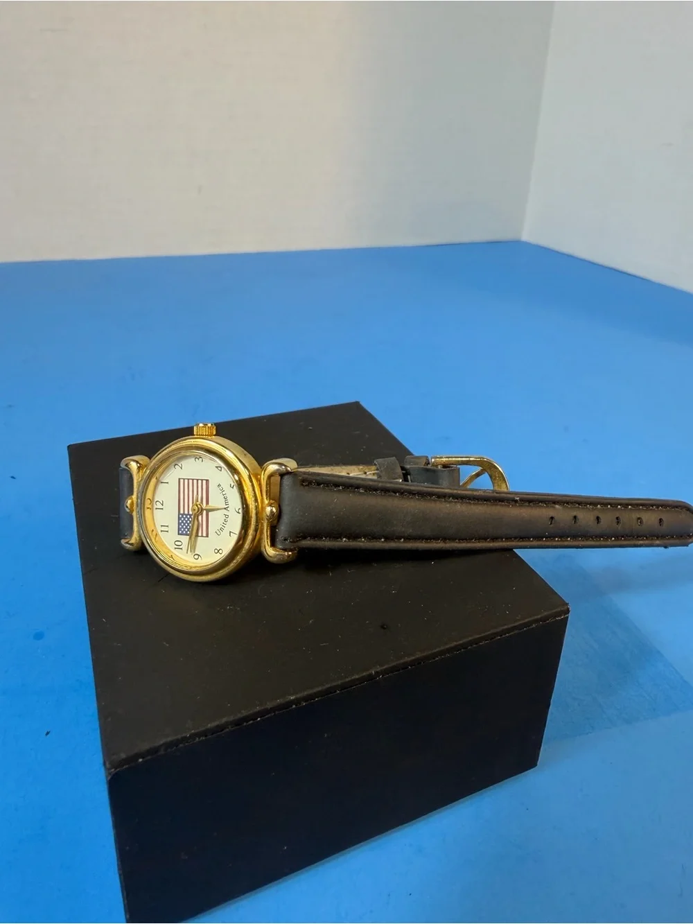 Gold Dial Black Leather Strap Women's Watch with American Flag Accent
